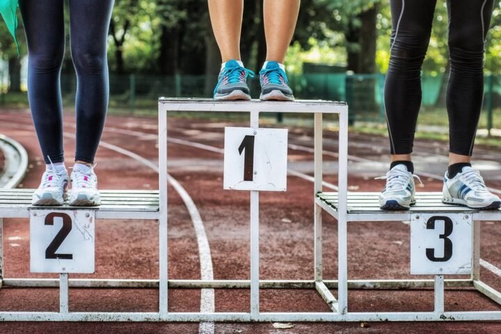 Close up of runners’ feet on a podium