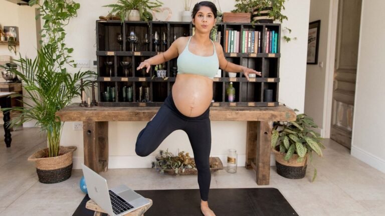 Pregnant woman doing online workout from The Bump Plan